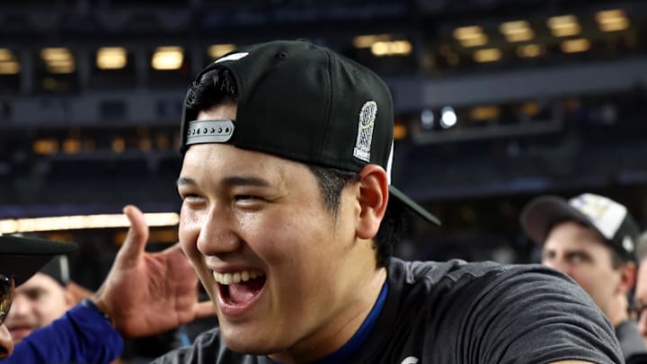 Oct 30, 2024; New York, New York, USA; Los Angeles Dodgers designated hitter Shohei Ohtani (17) celebrates after winning the 2024 MLB World Series against the New York Yankees at Yankee Stadium. Mandatory Credit: Vincent Carchietta-Imagn Images