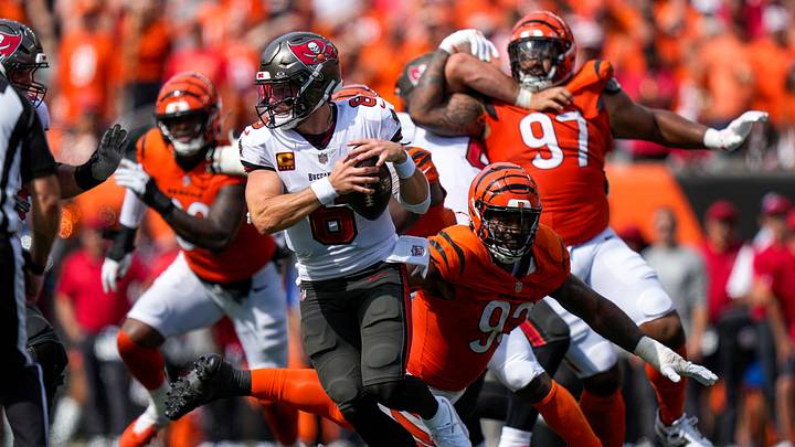 Cincinnati Bengals defensive tackle Jonathan Allen (93) gets a handle on Tampa Bay Buccaneers quarterback Baker Mayfield (6) as he scrambles in the fourth quarter of the NFL Week 1 game between the Cincinnati Bengals and the Tampa Bay Buccaneers at Paycor Stadium in Cincinnati on Sunday, Sept. 13, 2026. Cincinnati Bengals defensive tackle Jonathan Allen (93) gets a handle on Tampa Bay Buccaneers quarterback Baker Mayfield (6) as he scrambles in the fourth quarter of the NFL Week 1 game between the Cincinnati Bengals and the Tampa Bay Buccaneers at Paycor Stadium in Cincinnati on Sunday, Sept. 13, 2026.