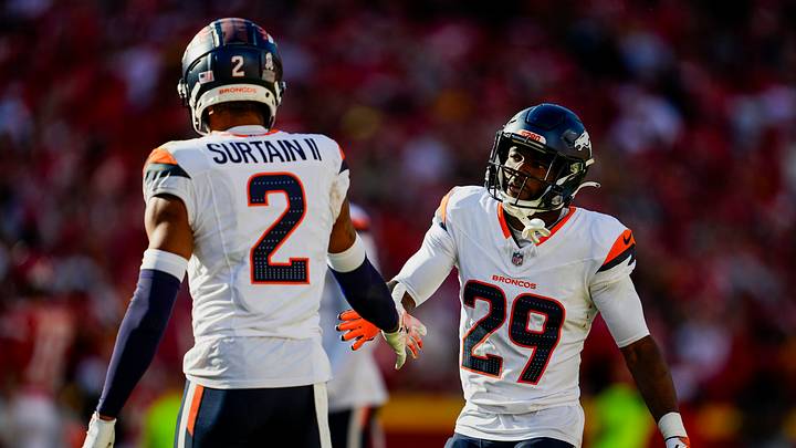 Nov 10, 2024; Kansas City, Missouri, USA; Denver Broncos cornerback Ja'Quan McMillian (29) celebrates with cornerback Pat Surtain II (2) after a play during the second half against the Kansas City Chiefs at GEHA Field at Arrowhead Stadium. Mandatory Credit: Jay Biggerstaff-Imagn Images Nov 10, 2024; Kansas City, Missouri, USA; Denver Broncos cornerback Ja'Quan McMillian (29) celebrates with cornerback Pat Surtain II (2) after a play during the second half against the Kansas City Chiefs at GEHA Field at Arrowhead Stadium. Mandatory Credit: Jay Biggerstaff-Imagn Images