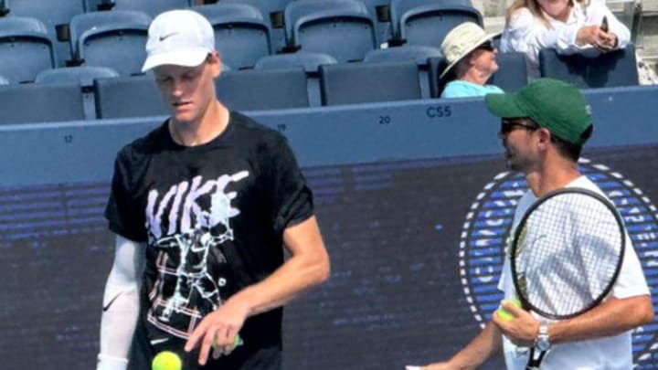 Jannik Sinner was wearing a compression sleeve on his right elbow during practice at the Cincinnati Open. 