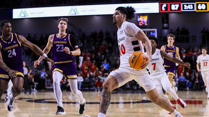 Dec 29, 2025; Cincinnati, Ohio, USA; Cincinnati Bearcats guard Shon Abaev (10) drives to the basket against the Lipscomb Bisons in the second half at Fifth Third Arena. Mandatory Credit: Katie Stratman-Imagn Images