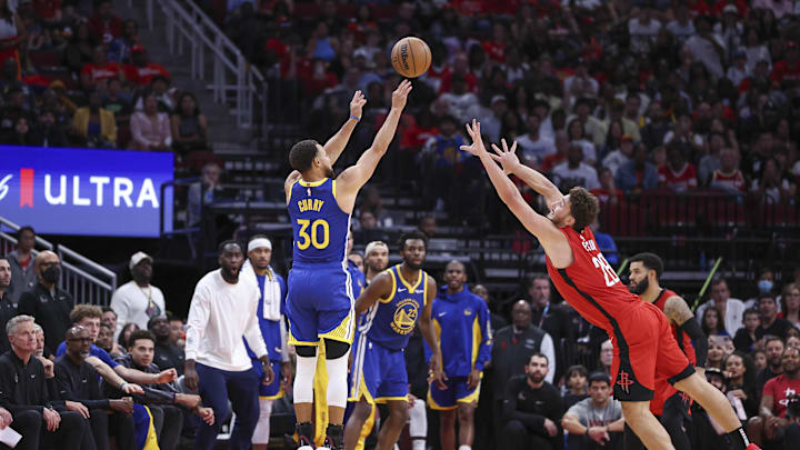 Oct 29, 2023; Houston, Texas, USA; Golden State Warriors guard Stephen Curry (30) shoots the ball as Houston Rockets center Alperen Sengun (28) defends during the fourth quarter at Toyota Center. M