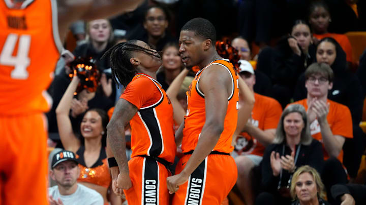 Oklahoma State Cowboys forward Abou Ousmane (33), right, and guard Khalil Brantley (5) celebrate during a college basketball game between the Oklahoma State Cowboys (OSU) and the Green Bay Phoenix at Gallagher-Iba Arena in Stillwater, Okla., Monday, Nov. 4, 2024. Oklahoma State Cowboys forward Abou Ousmane (33), right, and guard Khalil Brantley (5) celebrate during a college basketball game between the Oklahoma State Cowboys (OSU) and the Green Bay Phoenix at Gallagher-Iba Arena in Stillwater, Okla., Monday, Nov. 4, 2024.