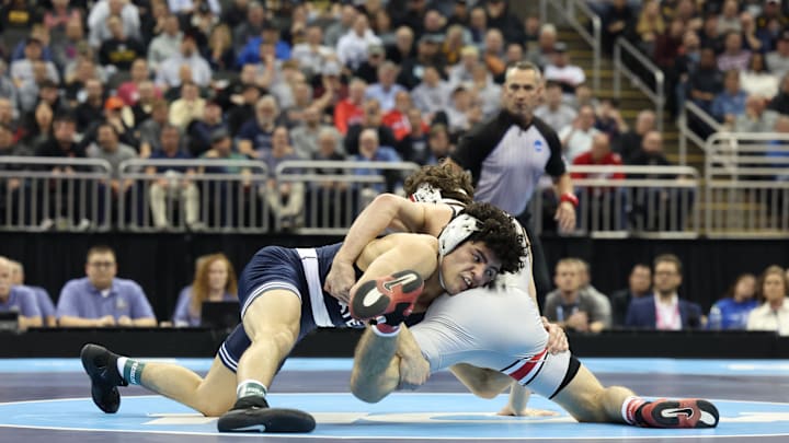 Penn State's Beau Bartlett wrestles Ohio State's Jesse Mendez in the 141-pound final at the 2024 NCAA Wrestling Championships. 