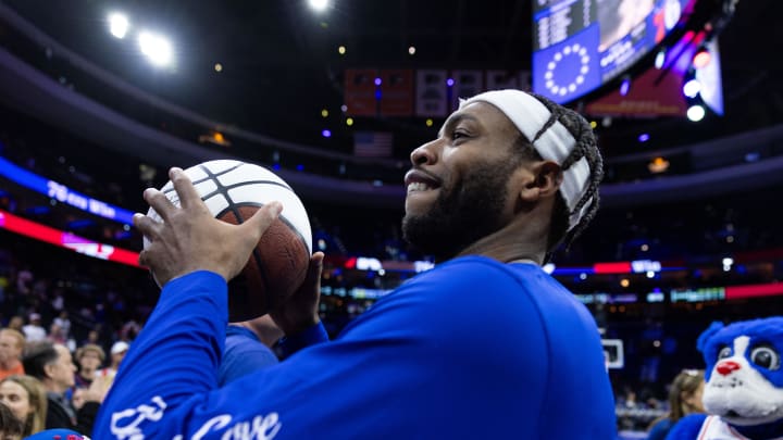 Apr 14, 2024; Philadelphia, Pennsylvania, USA; Philadelphia 76ers guard Buddy Hield throws his game ball into the stands after a victory against the Brooklyn Nets at Wells Fargo Center. Mandatory Credit: Bill Streicher-USA TODAY Sports