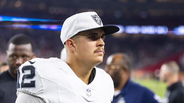 Aug 23, 2025; Glendale, Arizona, USA; Las Vegas Raiders quarterback Aidan O'Connell (12) against the Arizona Cardinals during a preseason NFL game at State Farm Stadium. Mandatory Credit: Mark J. Rebilas-Imagn Images Aug 23, 2025; Glendale, Arizona, USA; Las Vegas Raiders quarterback Aidan O'Connell (12) against the Arizona Cardinals during a preseason NFL game at State Farm Stadium. Mandatory Credit: Mark J. Rebilas-Imagn Images