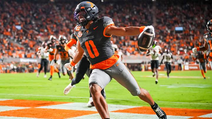Tennessee defensive back William Wright (0) returns an interception for a touchdown during Tennessee's game against New Mexico State in Neyland Stadium in Knoxville, Tenn., on Nov. 15, 2025.