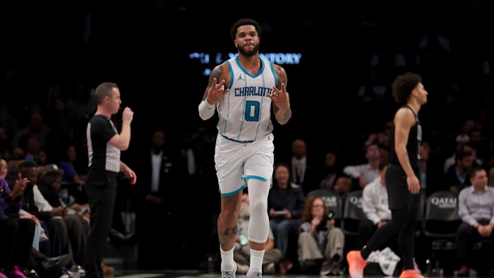 Nov 19, 2024; Brooklyn, New York, USA; Charlotte Hornets forward Miles Bridges (0) celebrates his three point shot against the Brooklyn Nets during the fourth quarter at Barclays Center. Mandatory Credit: Brad Penner-Imagn Images Nov 19, 2024; Brooklyn, New York, USA; Charlotte Hornets forward Miles Bridges (0) celebrates his three point shot against the Brooklyn Nets during the fourth quarter at Barclays Center. Mandatory Credit: Brad Penner-Imagn Images