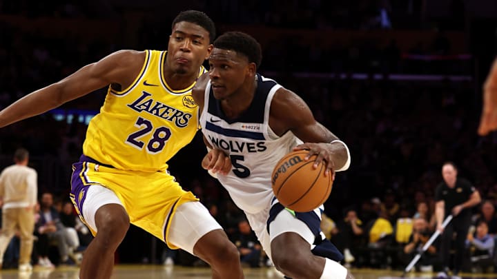 Oct 22, 2024; Los Angeles, California, USA; Minnesota Timberwolves guard Anthony Edwards (5) drives against Los Angeles Lakers forward Rui Hachimura (28) during the fourth quarter at Crypto.com Arena. Mandatory Credit: Jason Parkhurst-Imagn Images Oct 22, 2024; Los Angeles, California, USA; Minnesota Timberwolves guard Anthony Edwards (5) drives against Los Angeles Lakers forward Rui Hachimura (28) during the fourth quarter at Crypto.com Arena. Mandatory Credit: Jason Parkhurst-Imagn Images