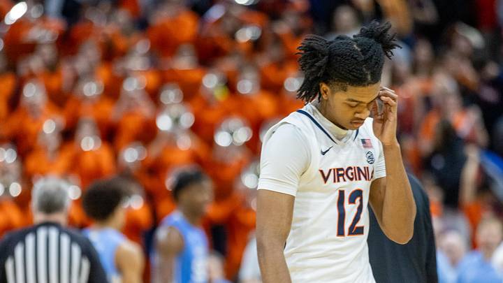 Feb 24, 2024; Charlottesville, Virginia, USA; Virginia Cavaliers guard Elijah Gertrude (12) walks off the court following the loss against the North Carolina Tar Heels at John Paul Jones Arena. Mandatory Credit: Hannah Pajewski-Imagn Images
