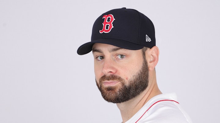Boston Red Sox starting pitcher Lucas Giolito (54) poses for a photo during media day at JetBlue Park in 2024.