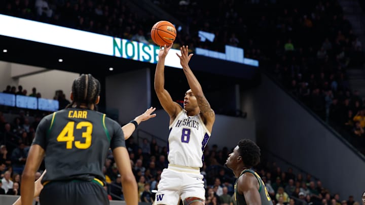 Washington Huskies forward Bryson Tucker (8) scores a basket against Baylor Bears guard Tounde Yessoufou (24) during the first half at Paul and Alejandra Foster Pavilion