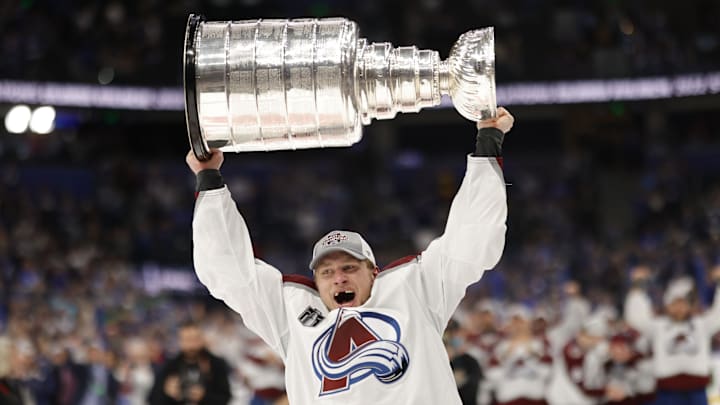 Jun 26, 2022; Tampa, Florida, USA; Colorado Avalanche defenseman Erik Johnson (6) celebrates with the Stanley Cup after the game against the Tampa Bay Lightning in game six of the 2022 Stanley Cup Final at Amalie Arena. Mandatory Credit: Geoff Burke-Imagn Images