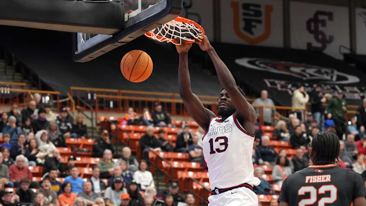 Gonzaga Bulldogs forward Graham Ike (13) dunks against the Pacific Tigers during the first half at Alex G. Spanos Center
