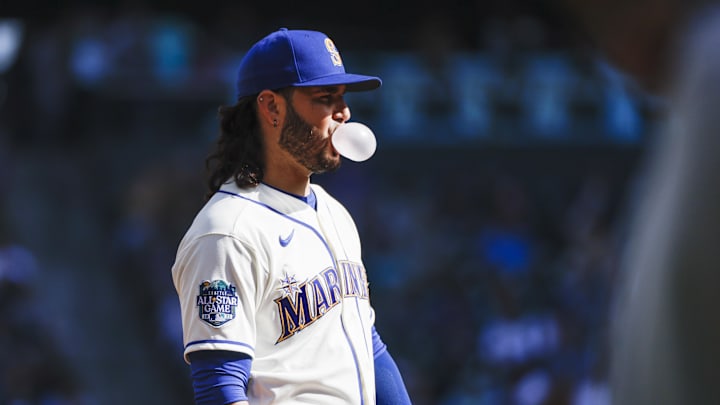 Seattle Mariners third baseman Eugenio Suarez (28) blows a bubble while waiting between pitches against the Texas Rangers during the second inning at T-Mobile Park in 2023. Seattle Mariners third baseman Eugenio Suarez (28) blows a bubble while waiting between pitches against the Texas Rangers during the second inning at T-Mobile Park in 2023.