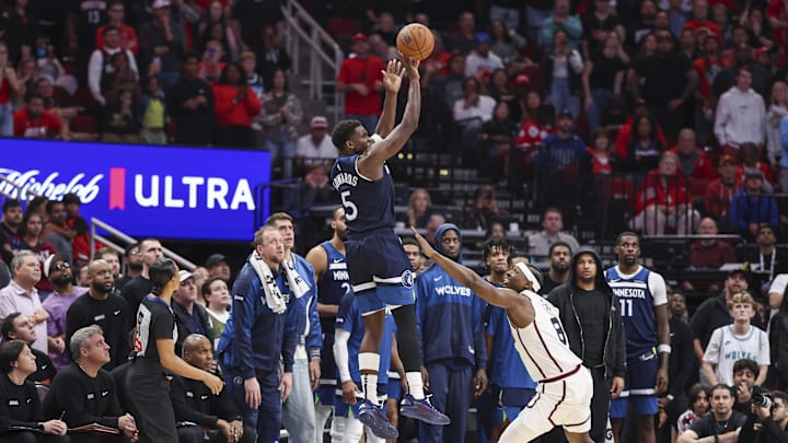Minnesota Timberwolves guard Anthony Edwards hits a three-pointer against the Houston Rockets.
