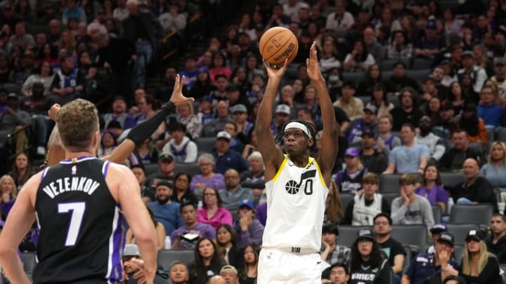 Mar 31, 2024; Sacramento, California, USA; Utah Jazz forward Taylor Hendricks (0) shoots against the Sacramento Kings during the fourth quarter at Golden 1 Center. Mandatory Credit: Darren Yamashita-USA TODAY Sports