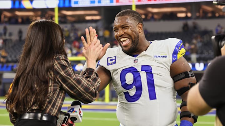 Nov 23, 2025; Inglewood, California, USA; Los Angeles Rams defensive end Kobie Turner (91) shakes hands with a member of the media after the game against the Tampa Bay Buccaneers at SoFi Stadium. Mandatory Credit: Kiyoshi Mio-Imagn Images
