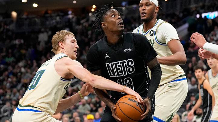 Apr 10, 2026; Milwaukee, Wisconsin, USA; Milwaukee Bucks guard AJ Green (20) defends Brooklyn Nets forward Trevon Scott (13) during the third quarter at Fiserv Forum. Mandatory Credit: Jeff Hanisch-Imagn Images Apr 10, 2026; Milwaukee, Wisconsin, USA; Milwaukee Bucks guard AJ Green (20) defends Brooklyn Nets forward Trevon Scott (13) during the third quarter at Fiserv Forum. Mandatory Credit: Jeff Hanisch-Imagn Images