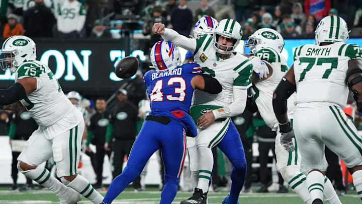 Oct 14, 2024; East Rutherford, New Jersey, USA; Buffalo Bills linebacker Terrel Bernard (43) hits New York Jets quarterback Aaron Rodgers (8) 