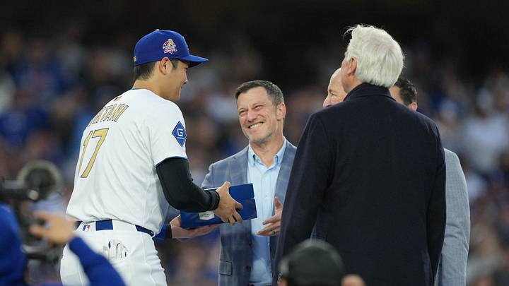 Mar 28, 2025; Los Angeles, California, USA; President of Baseball Operations for the Los Angeles Dodgers Andrew Friedman congratulates pitcher Shohei Ohtani (17) during the ring ceremony prior to the game against the Detroit Tigers at Dodger Stadium. Mandatory Credit: Kirby Lee-Imagn Images Mar 28, 2025; Los Angeles, California, USA; President of Baseball Operations for the Los Angeles Dodgers Andrew Friedman congratulates pitcher Shohei Ohtani (17) during the ring ceremony prior to the game against the Detroit Tigers at Dodger Stadium. Mandatory Credit: Kirby Lee-Imagn Images