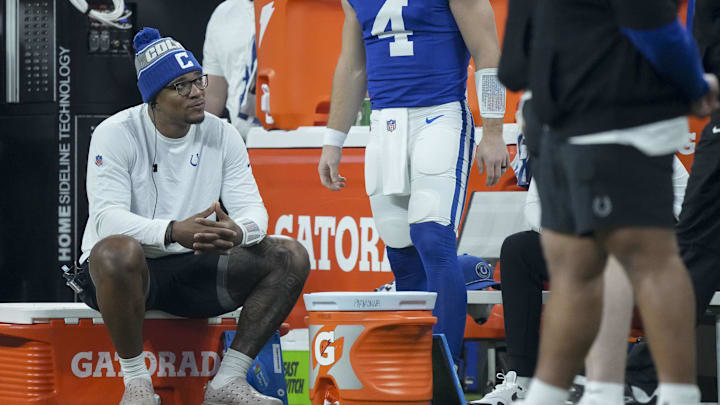 Jan 5, 2025; Indianapolis, Indiana, USA; Indianapolis Colts quarterback Anthony Richardson (5) sits on the sideline during a game against the Jacksonville Jaguars at Lucas Oil Stadium. Mandatory Credit: Grace Hollars-USA TODAY Network via Imagn Images