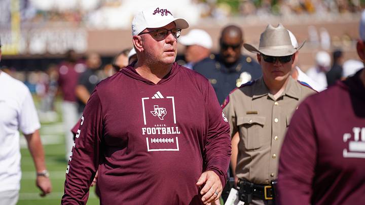 Oct 10, 2026; Columbia, Missouri, USA; Texas A&M Aggies head coach Mike Elko leaves the field after the first half against the Missouri Tigers during the first half of the game at Faurot Field at Memorial Stadium. Mandatory Credit: Denny Medley-Imagn Images Oct 10, 2026; Columbia, Missouri, USA; Texas A&M Aggies head coach Mike Elko leaves the field after the first half against the Missouri Tigers during the first half of the game at Faurot Field at Memorial Stadium. Mandatory Credit: Denny Medley-Imagn Images