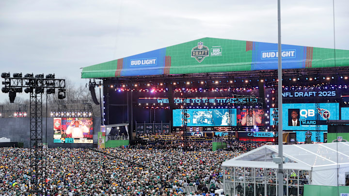 Fans look on as Cam Ward is announced as the first pick during the first day of the NFL Draft presented by Bud Light at the Draft Theater Thursday, April 24, 2025, outside of Lambeau Field in Green Bay, Wisconsin.