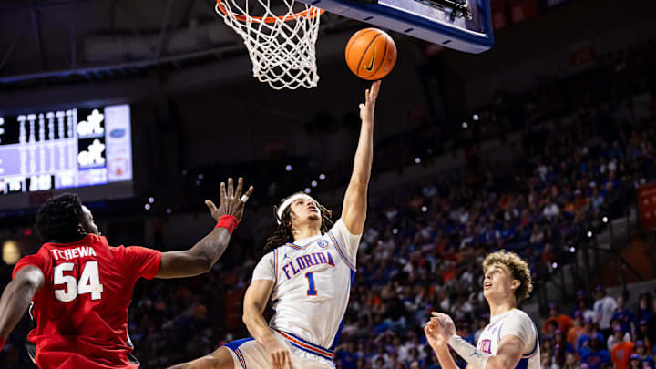Jan 27, 2024; Gainesville, Florida, USA; Florida Gators guard Walter Clayton Jr. (1) makes a layup