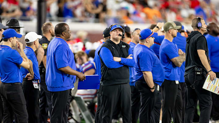 Florida Gators defensive coordinator Austin Armstrong looks at the scoreboard during the second half