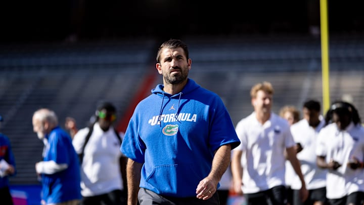 Florida Gators associate head coach and director of strength and conditioning Mark Hocke walks on the field during Gator Walk during the Florida Gators Orange and Blue Spring Game at Steve Spurrier Field at Ben Hill Griffin Stadium in Gainesville, FL on Thursday, April 13, 2023. [Matt Pendleton/Gainesville Sun]

Ncaa Football Florida Gators Orange Blue Spring Game