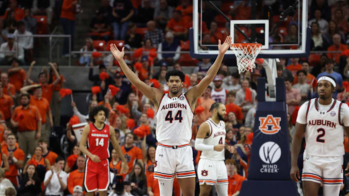 Feb 22, 2025; Auburn, Alabama, USA; Auburn Tigers center Dylan Cardwell (44) tries to get the crowd involved against the Georgia Bulldogs during the second half at Neville Arena.  Mandatory Credit: John Reed-Imagn Images