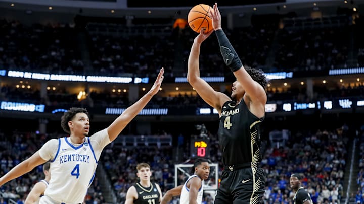 Mar 21, 2024; Pittsburgh, PA, USA; Oakland Golden Grizzlies forward Trey Townsend (4) jumps to shoot