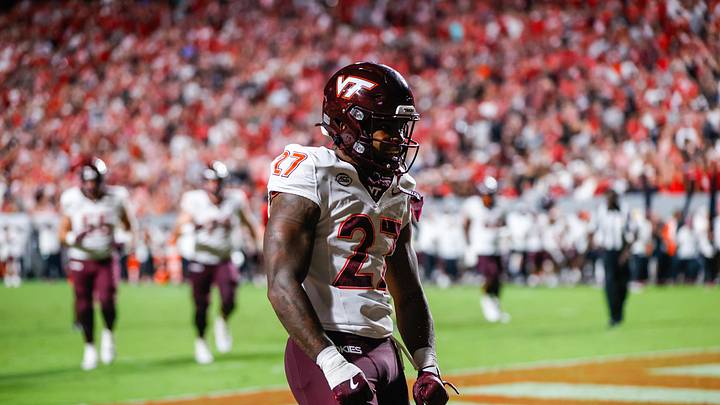 Sep 27, 2025; Raleigh, North Carolina, USA; Virginia Tech Hokies running back Marcellous Hawkins (27) makes a touchdown and celebrates during the first half of the game against North Carolina State Wolfpack at Carter-Finley Stadium. Mandatory Credit: Jaylynn Nash-Imagn Images Sep 27, 2025; Raleigh, North Carolina, USA; Virginia Tech Hokies running back Marcellous Hawkins (27) makes a touchdown and celebrates during the first half of the game against North Carolina State Wolfpack at Carter-Finley Stadium. Mandatory Credit: Jaylynn Nash-Imagn Images