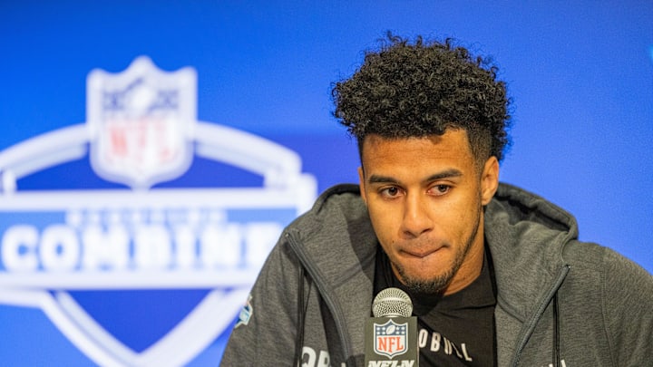 Mar 1, 2024; Indianapolis, IN, USA;  Florida State quarterback Jordan Travis (QB13) talks to the