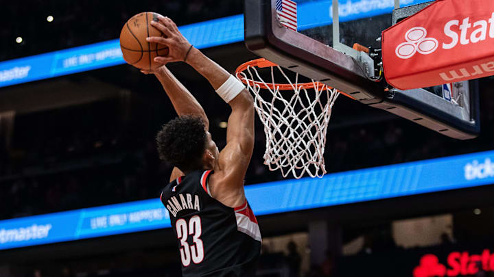 Mar 27, 2024; Atlanta, Georgia, USA; Portland Trail Blazers forward Toumani Camara (33) dunks against Atlanta Hawks during the second quarter at State Farm Arena. Mandatory Credit: Jordan Godfree-USA TODAY Sports
