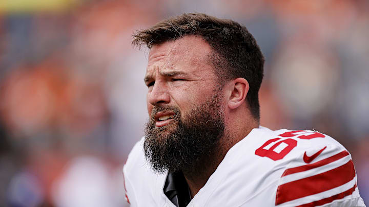 Oct 19, 2025; Denver, Colorado, USA; New York Giants guard Austin Schlottmann (65) warms up before the game against the Denver Broncos at Empower Field at Mile High. Mandatory Credit: Isaiah J. Downing-Imagn Images