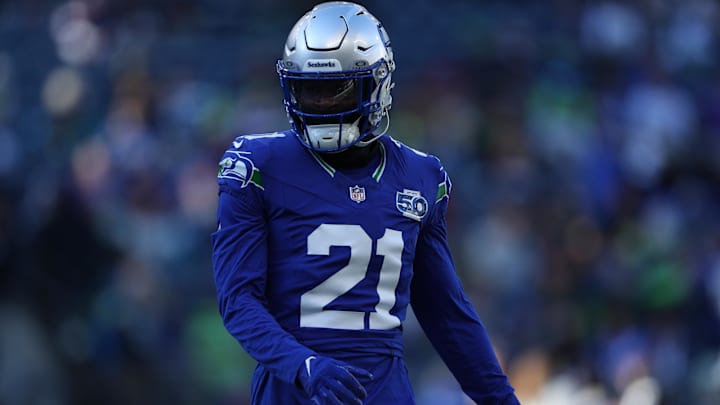 Seattle Seahawks cornerback Devon Witherspoon (21) warms up Seattle Seahawks cornerback Devon Witherspoon (21) warms up
