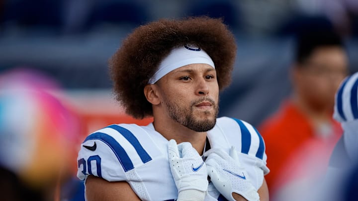 Oct 6, 2022; Denver, Colorado, USA; Indianapolis Colts running back Phillip Lindsay (30) before the