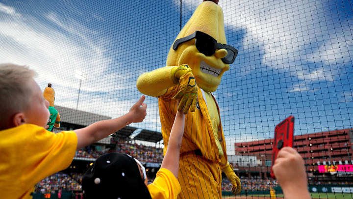Split entertains fans during a baseball game between Savannah Bananas and the Party Animals at Chickasaw Bricktown Ballpark in Oklahoma City, Thursday, May, 16, 2024.