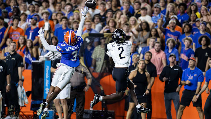 Florida Gators defensive back Jason Marshall Jr. (3) breaks up a pass to UCF Knights wide receiver Kobe Hudson (2) during the first half at Ben Hill Griffin Stadium last season.