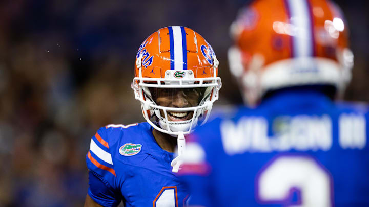 Sep 7, 2024; Gainesville, Florida, USA; Florida Gators wide receiver Aidan Mizell (11) smiles at Florida Gators wide receiver Eugene Wilson III (3) after a touchdown against the Samford Bulldogs during the second half at Ben Hill Griffin Stadium. Mandatory Credit: Matt Pendleton-Imagn Images