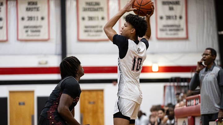 FSUS Seminoles guard Amare Robinson (0) defends The Rock National Lions guard Joseph Hartman (10) during the first half at The Rock School in Gainesville, FL on Friday, January 19, 2024. [Matt Pendleton/Gainesville Sun]