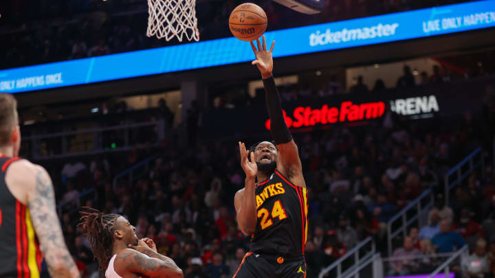 Apr 9, 2024; Atlanta, Georgia, USA; Atlanta Hawks forward Bruno Fernando (24) shoots against the Miami Heat in the second half at State Farm Arena. Mandatory Credit: Brett Davis-USA TODAY Sports
