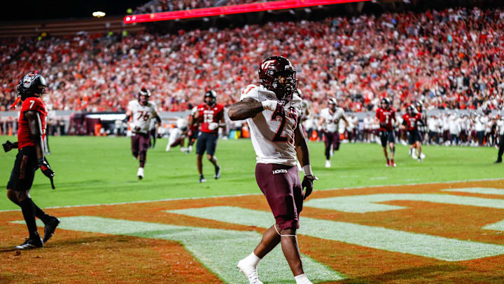 Sep 27, 2025; Raleigh, N.C.; Virginia Tech running back Marcellous Hawkins (27) scores a touchdown.