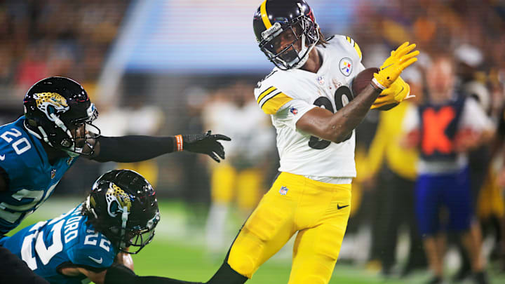Pittsburgh Steelers wide receiver Tyler Vaughns #80 dodges Jacksonville Jaguars safety Daniel Thomas #20 and cornerback Xavier Crawford #22 during the fourth quarter of an NFL preseason game Saturday, Aug. 20, 2022 at TIAA Bank Field in Jacksonville. The Pittsburgh Steelers defeated the Jacksonville Jaguars 16-15. [Corey Perrine/Florida Times-Union]

Jki 082022 Jags Vs Steelers Cp 43