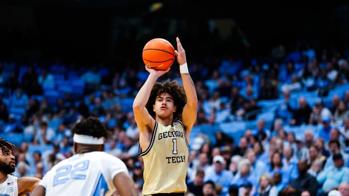Dec 7, 2024; Chapel Hill, North Carolina, USA; Georgia Tech Yellow Jackets guard Naithan George (1) shoots a three pointer during the first half of the game against the North Carolina Tar Heels at Dean E. Smith Center. Mandatory Credit: Jaylynn Nash-Imagn Images Dec 7, 2024; Chapel Hill, North Carolina, USA; Georgia Tech Yellow Jackets guard Naithan George (1) shoots a three pointer during the first half of the game against the North Carolina Tar Heels at Dean E. Smith Center. Mandatory Credit: Jaylynn Nash-Imagn Images