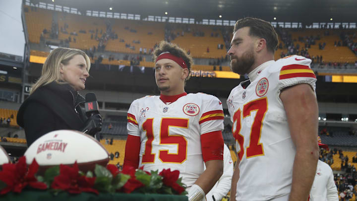 Dec 25, 2024; Pittsburgh, Pennsylvania, USA;  Netflix reporter Stacey Dales (left) interviews Kansas City Chiefs quarterback Patrick Mahomes (15) and tight end Travis Kelce (87) after the Chief defeated the Pittsburgh Steelers at Acrisure Stadium. Mandatory Credit: Charles LeClaire-Imagn Images