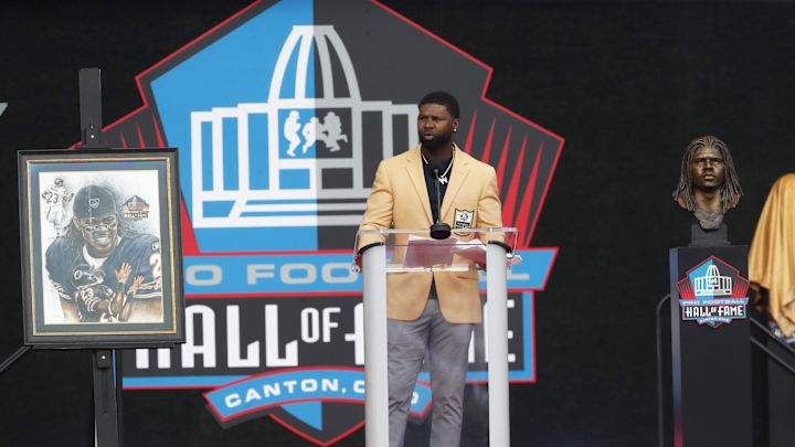 Aug 3, 2024; Canton, OH, USA;  Devin Hester during his acceptance speech into the Pro Football Hall of Fame at the enshrinement ceremony at Tom Benson Hall of Fame Stadium.