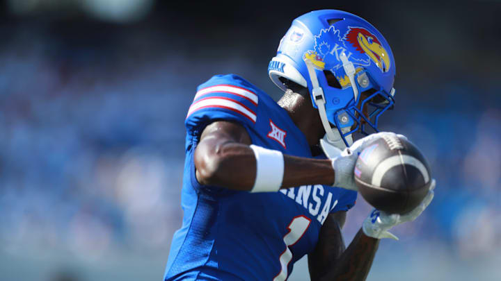 Kansas senior wide receiver Emmanuel Henderson Jr. 1) warms up before the game between Fresno State and Kansas at David Booth Kansas Memorial Stadium on Aug. 23, 2025. Kansas senior wide receiver Emmanuel Henderson Jr. 1) warms up before the game between Fresno State and Kansas at David Booth Kansas Memorial Stadium on Aug. 23, 2025.
